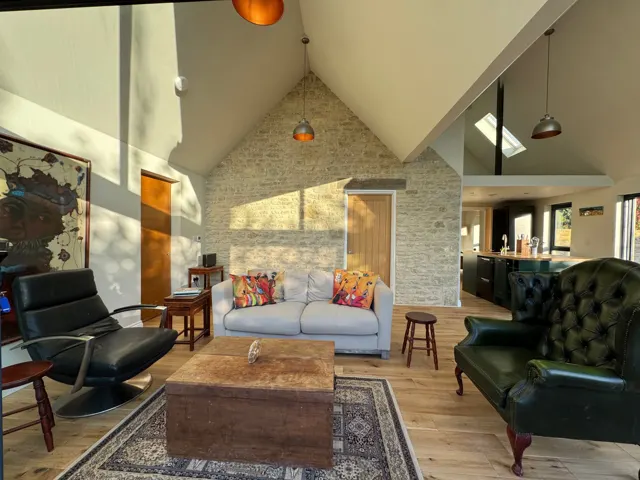 Sitting room and stone wall