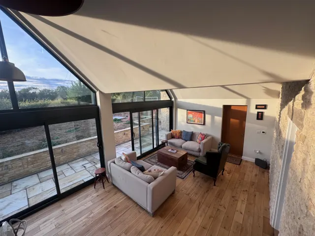 Living space and open terrace doors
