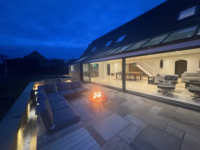 Terrace and fire pit at dusk