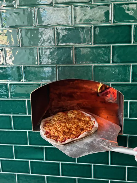 Fresh pizza from the oven